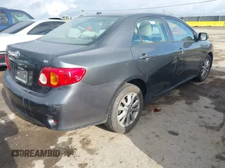 2009 Toyota Corolla with VIN 1NXBU40E79Z042778, listed as a IAAI auction lot 41928062 with 201,409 mi miles. Bid and sale history available at carsss.com. Image 4.