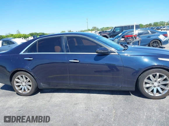 2016 Cadillac CTS RWD with VIN 1G6AP5SX8G0119984, listed as a IAAI auction lot 41679567 with 98,592 mi miles and . Bid and sale history available at DreamBid. Image 13.