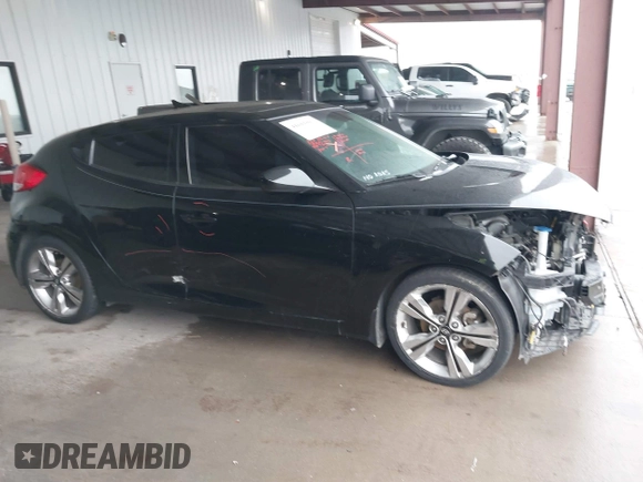 2017 Hyundai Veloster Value Edition with VIN KMHTC6AD6HU321999, listed as a IAAI auction lot 41611017 with 99,382 mi miles. Bid and sale history available at carsss.com. Image 13.