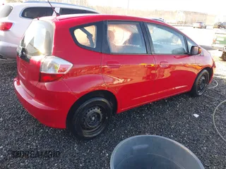 2013 Honda Fit with VIN JHMGE8H35DC081416, listed as a IAAI auction lot 41503165 with 151,223 mi miles. Bid and sale history available at carsss.com. Image 4.