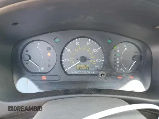 1997 Mitsubishi Mirage z VIN JA3AY36A9VU027615, wystawiony jako Copart lot #77401214 z przebiegiem 104 407 mil mil oraz Szkoda całkowita • Salvage title. Historia ofert i sprzedaży dostępna na DreamBid. Obrazek 9.