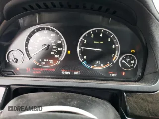 2013 BMW 7 Series 740Li with VIN WBAYE4C51DD137687, listed as a Copart auction lot 76103944 with 134,609 mi miles and Salvage title. Bid and sale history available at DreamBid. Image 9.