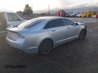 2015 Lincoln MKZ Hybrid z VIN 3LN6L2LU7FR614253, wystawiony jako IAAI lot #40872678 z przebiegiem 185 637 mil mil oraz . Historia ofert i sprzedaży dostępna na DreamBid. Obrazek 4.