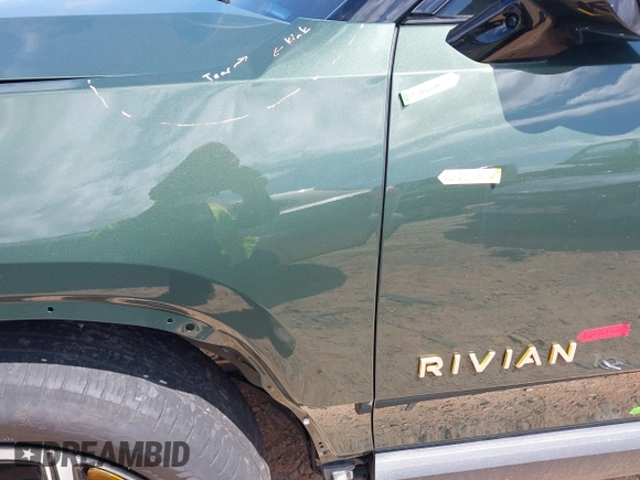 2023 Rivian R1T Adventure z VIN 7FCTGAAAXPN019894, wystawiony jako IAAI lot #42168226 z przebiegiem 23 380 mil mil oraz . Historia ofert i sprzedaży dostępna na DreamBid. Obrazek 23.