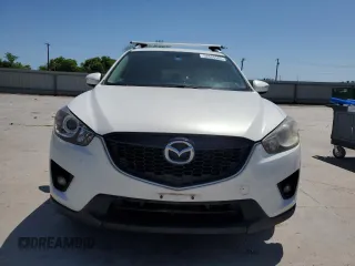 2015 Mazda CX-5 Touring with VIN JM3KE2CY5F0548826, listed as a Copart auction lot 52686565 with 139,602 mi miles and Salvage Title. Bid and sale history available at carsss.com. Image 5.