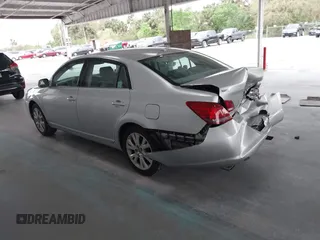 2009 Toyota Avalon XL with VIN 4T1BK36B69U341854, listed as a IAAI auction lot 41727553 with 102,369 mi miles. Bid and sale history available at carsss.com. Image 3.