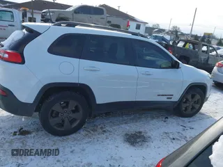 2016 Jeep Cherokee Latitude with VIN 1C4PJMCB7GW304109, listed as a IAAI auction lot 41330879 with 114,503 mi miles. Bid and sale history available at carsss.com. Image 13.