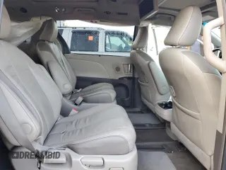 2012 Toyota Sienna XLE AAS z VIN 5TDYK3DC7CS220708, wystawiony jako Copart lot #58295075 z przebiegiem 154 529 mil mil oraz Szkoda całkowita • Salvage title. Historia ofert i sprzedaży dostępna na DreamBid. Obrazek 11.