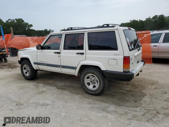 2001 Jeep Cherokee Sport with VIN 1J4FF48S31L520760, listed as a Copart auction lot 59807625 with 298,489 mi miles and Salvage title. Bid and sale history available at DreamBid. Image 2.