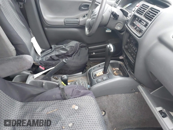 2003 Chevrolet Tracker with VIN 2CNBJ13C236947064, listed as a IAAI auction lot 41820066 with Not provided miles and . Bid and sale history available at DreamBid. Image 5.