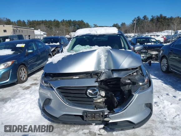 2016 Mazda CX-9 Sport with VIN JM3TCBBYXG0117878, listed as a IAAI auction lot 41617757 with 114,231 mi miles. Bid and sale history available at carsss.com. Image 12.