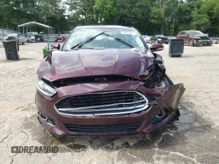 2013 Ford Fusion SE Hybrid z VIN 3FA6P0LU7DR197801, wystawiony jako Copart lot #60468095 z przebiegiem 169 215 mil mil oraz Szkoda całkowita • Salvage title. Historia ofert i sprzedaży dostępna na DreamBid. Obrazek 5.