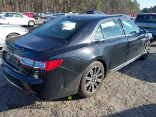 2017 Lincoln Continental Reserve with VIN 1LN6L9RP3H5628165, listed as a IAAI auction lot 41489434 with 143,171 mi miles. Bid and sale history available at carsss.com. Image 4.