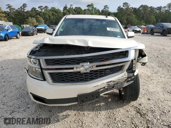 2015 Chevrolet Tahoe LT with VIN 1GNSCBKC9FR220574, listed as a Copart auction lot 54788555 with 244,491 mi miles and Salvage title. Bid and sale history available at DreamBid. Image 5.