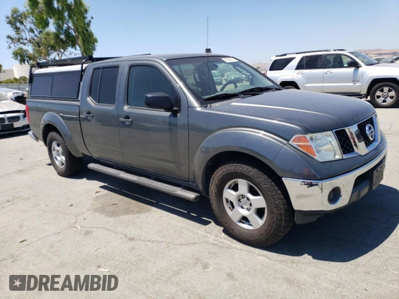 2007 Nissan Frontier SE with VIN 1N6AD09UX7C423043, listed as a Copart auction lot 63322635 with 160,664 mi miles and Salvage title. Bid and sale history available at DreamBid. Image 4.