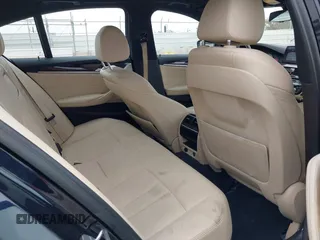 2019 BMW 5 Series 530e with VIN WBAJA9C56KB388241, listed as a IAAI auction lot 42181217 with 69,805 mi miles and . Bid and sale history available at carsss.com. Image 8.