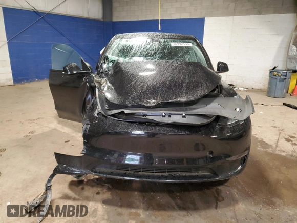 2024 Tesla Model Y с VIN 7SAYGDED0RF084081, выставлен на аукционе Copart как лот 55992195 с пробегом 43 871 миль миль и Списание • Salvage title. История ставок и продаж доступна на DreamBid. Изображение 5.