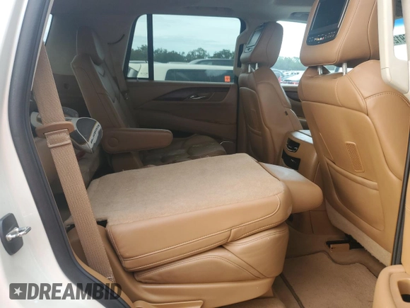 2015 Cadillac Escalade Platinum z VIN 1GYS4PKJ5FR574930, wystawiony jako Copart lot #74691204 z przebiegiem Nie podano mil oraz Szkoda całkowita • Salvage title. Historia ofert i sprzedaży dostępna na DreamBid. Obrazek 10.