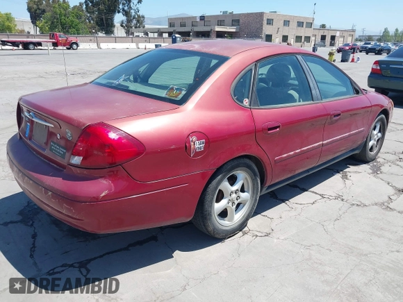 2003 Ford Taurus SES Standard with VIN 1FAFP55243G191713, listed as a IAAI auction lot 42145771 with 232,282 mi miles. Bid and sale history available at carsss.com. Image 4.