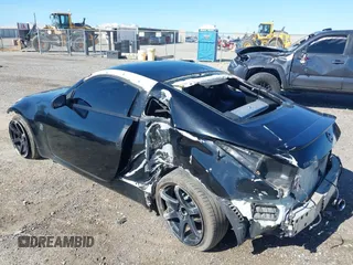 2004 Nissan 350Z Touring with VIN JN1AZ34D94M102990, listed as a IAAI auction lot 41830661 with 107,520 mi miles. Bid and sale history available at carsss.com. Image 3.