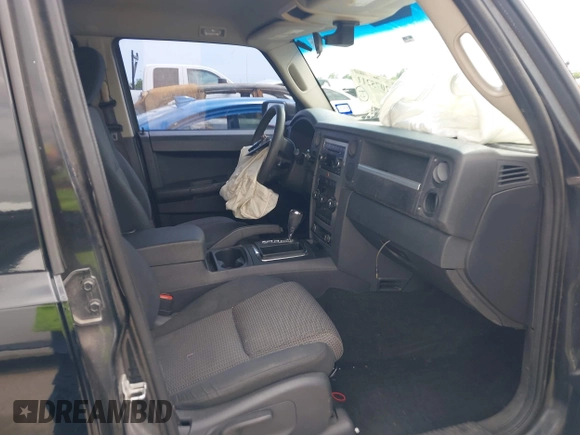 2008 Jeep Commander Sport with VIN 1J8HH48KX8C167462, listed as a IAAI auction lot 42075211 with 183,981 mi miles and . Bid and sale history available at DreamBid. Image 5.