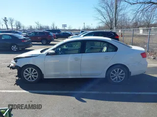 2012 Volkswagen Jetta Sedan SE w/Convenience PZEV with VIN 3VWDP7AJ2CM374783, listed as a IAAI auction lot 41636257 with 124,458 mi miles. Bid and sale history available at carsss.com. Image 14.