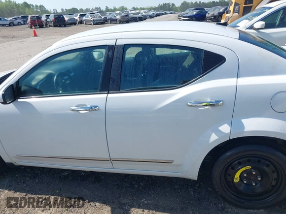 2013 Dodge Avenger SXT with VIN 1C3CDZCG2DN508594, listed as a IAAI auction lot 41771945 with 104,924 mi miles and . Bid and sale history available at DreamBid. Image 12.