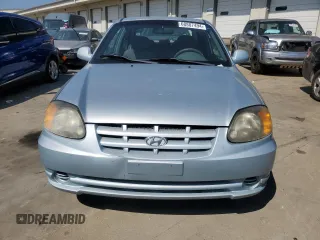 2003 Hyundai Accent GL with VIN KMHCG35CX3U274974, listed as a Copart auction lot 68807494 with 133,791 mi miles and Non Repairable. Bid and sale history available at carsss.com. Image 5.