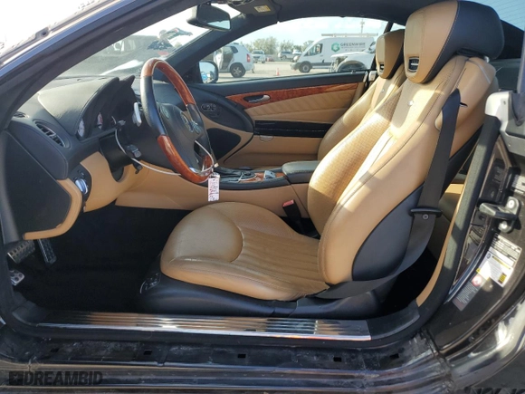 2009 Mercedes-Benz SL-Class V8 with VIN WDBSK71F09F144591, listed as a Copart auction lot 46873785 with 63,977 mi miles and Salvage Title. Bid and sale history available at carsss.com. Image 7.