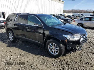 2021 Chevrolet Traverse LT Leather with VIN 1GNEVHKW3MJ196014, listed as a Copart auction lot 49678595 with 124,695 mi miles and Salvage Title. Bid and sale history available at carsss.com. Image 4.