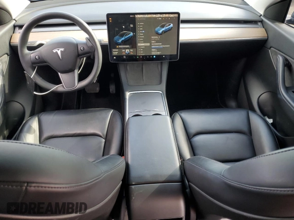 2021 Tesla Model Y Long Range with VIN 5YJYGDEE6MF200883, listed as a Copart auction lot 51707405 with 59,820 mi miles and Salvage Title. Bid and sale history available at DreamBid. Image 8.