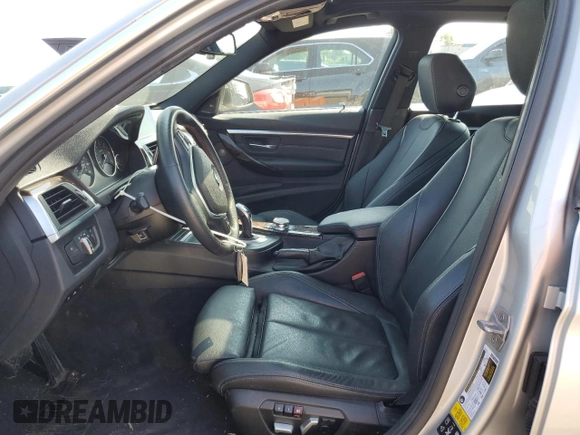 2018 BMW 3 Series with VIN WBA8F1C59JK898499, listed as a Copart auction lot 68247874 with 107,189 mi miles and Salvage title. Bid and sale history available at DreamBid. Image 7.