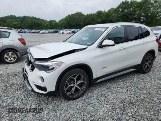 2018 BMW X1 xDrive28i with VIN WBXHT3C36J5L24918, listed as a Copart auction lot 62171365 with 23,446 mi miles and Salvage title. Bid and sale history available at DreamBid. Image 1.