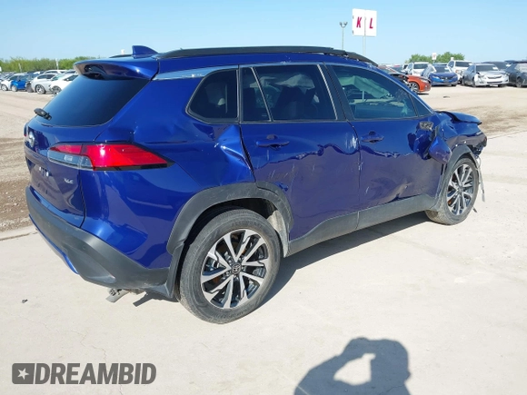 2022 Toyota Corolla Cross XLE with VIN 7MUDAAAG8NV027585, listed as a IAAI auction lot 41781177 with 36,841 mi miles and . Bid and sale history available at DreamBid. Image 4.