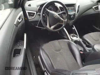2012 Hyundai Veloster w/Black Int with VIN KMHTC6AD5CU065525, listed as a Copart auction lot 56415785 with 100,151 mi miles and Salvage title. Bid and sale history available at DreamBid. Image 8.