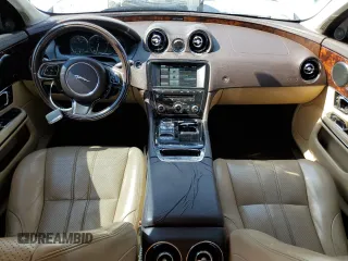 2015 Jaguar XJ with VIN SAJWA1CZ8F8V81637, listed as a Copart auction lot 55619555 with 88,328 mi miles and Salvage Title. Bid and sale history available at DreamBid. Image 8.