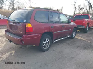 2008 GMC Envoy SLE2 with VIN 1GKDT13S682120370, listed as a IAAI auction lot 41653263 with 214,739 mi miles. Bid and sale history available at carsss.com. Image 4.