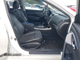 2014 Nissan Altima SV with VIN 1N4AL3AP0EC325820, listed as a IAAI auction lot 41971311 with 206,134 mi miles and . Bid and sale history available at DreamBid. Image 5.