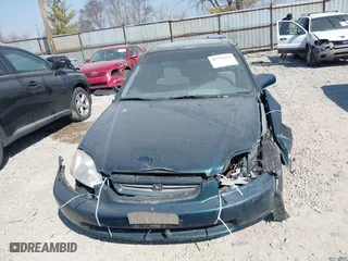 1998 Honda Civic EX with VIN 1HGEJ8249WL057484, listed as a IAAI auction lot 41776124 with 203,020 mi miles. Bid and sale history available at carsss.com. Image 12.