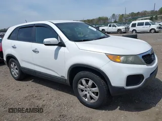 2011 Kia Sorento LX with VIN 5XYKTCA11BG180272, listed as a IAAI auction lot 42125073 with 137,156 mi miles and . Bid and sale history available at DreamBid. Image 1.