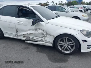 2014 Mercedes-Benz C-Class C 250 Sport with VIN WDDGF4HB9EA945465, listed as a IAAI auction lot 42035693 with 146,809 mi miles. Bid and sale history available at carsss.com. Image 6.