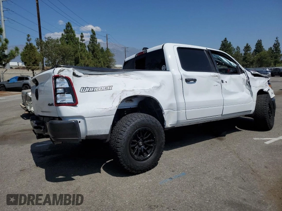 2023 Ram 1500 Tradesman with VIN 1C6SRFGT7PN684311, listed as a Copart auction lot 69792804 with 13,946 mi miles and Salvage title. Bid and sale history available at DreamBid. Image 3.