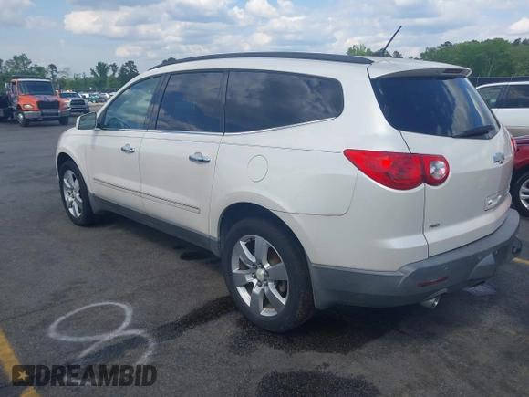 2011 Chevrolet Traverse LTZ with VIN 1GNKVLED5BJ167465, listed as a IAAI auction lot 42002979 with 167,271 mi miles and . Bid and sale history available at DreamBid. Image 3.