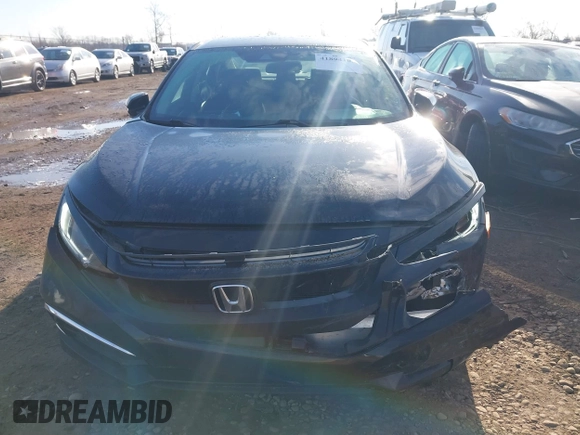 2020 Honda Civic LX with VIN 19XFC2F68LE029699, listed as a IAAI auction lot 41894102 with 113,900 mi miles and . Bid and sale history available at DreamBid. Image 12.