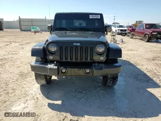 2015 Jeep Wrangler Unlimited Sahara with VIN 1C4BJWEG6FL774968, listed as a Copart auction lot 45646525 with 71,528 mi miles and Salvage Title. Bid and sale history available at carsss.com. Image 11.