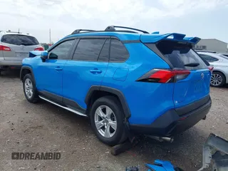 2021 Toyota RAV4 XLE with VIN 2T3W1RFV3MW164777, listed as a IAAI auction lot 41708032 with 76,854 mi miles. Bid and sale history available at carsss.com. Image 3.