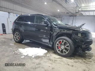 2012 Jeep Grand Cherokee SRT8 with VIN 1C4RJFDJ7CC187475, listed as a Copart auction lot 45191285 with 133,748 mi miles and Salvage Title. Bid and sale history available at carsss.com. Image 4.