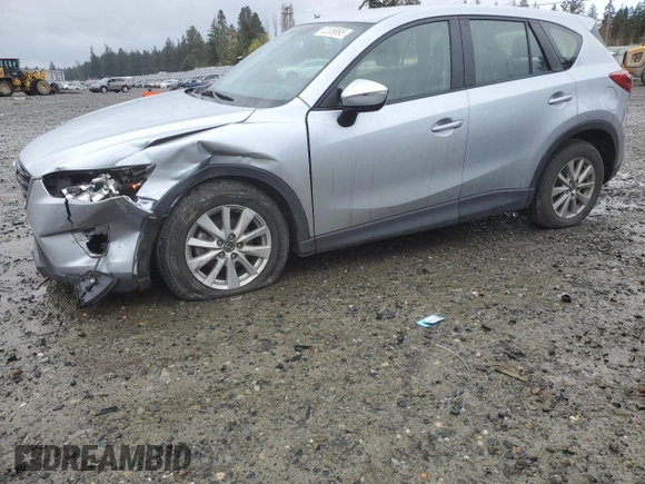 2016 Mazda CX-5 Sport z VIN JM3KE4BY5G0726376, wystawiony jako Copart lot #52009995 z przebiegiem 113 533 mil mil oraz Szkoda całkowita • Salvage title. Historia ofert i sprzedaży dostępna na DreamBid. Obrazek 1.