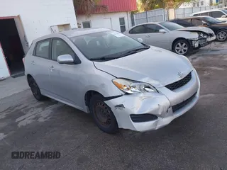 2009 Toyota Matrix with VIN 2T1KU40E59C106253, listed as a IAAI auction lot 41974823 with 126,155 mi miles. Bid and sale history available at carsss.com. Image 1.