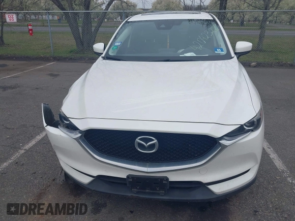 2017 Mazda CX-5 Touring with VIN JM3KFACL5H0189296, listed as a IAAI auction lot 42042328 with 60,208 mi miles and . Bid and sale history available at carsss.com. Image 12.